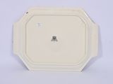an image of a close up of a plate on a white surface