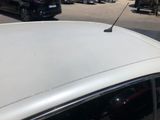 a car that is parked on the side of the road