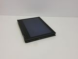 a tablet computer sitting on a table with a white background