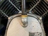 a close up view of a motorcycle engine and its gear
