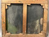 an old wooden window with a glass pane on the outside of it