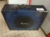 a suitcase that is sitting on the floor in the room