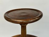 a wooden stool with a wooden seat on a white background