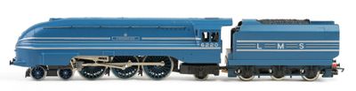 a toy train that is sitting on a white surface