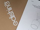 a brown box with a white sign on it and a brown box with a white sign on it