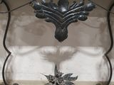 a table with a marble top and a metal base