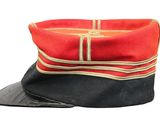 a red and black hat on a white background