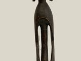 a statue of a person with a hat on it ' s head