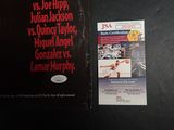 a book with a picture of a basketball game on it