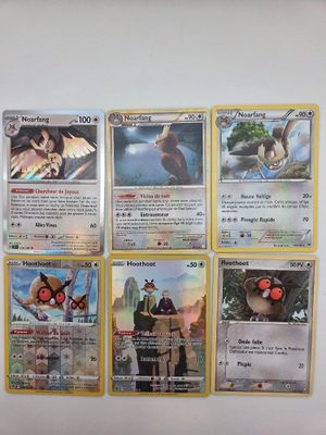 beaucoup de cartes pokemon sur le mur