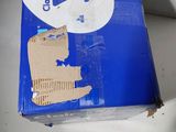 a cardboard box that has a picture of a man on it