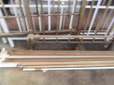 several pieces of wood are stacked on top of each other in a room