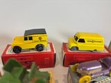 three toy cars that are sitting on top of each other