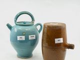 two vases that are next to each other on a table