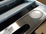 a machine that is sitting in a box on the floor