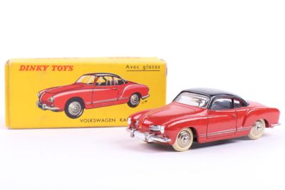 dinky toys red car with box and box on white background