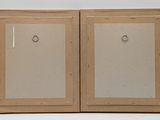pair of framed photographs of a couple of doors on a white background