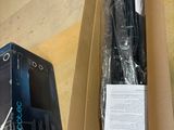 a box with a computer inside of it sitting on a shelf