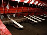 a red and white machine that is sitting in a room