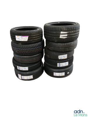 several tires stacked on top of each other on a white background