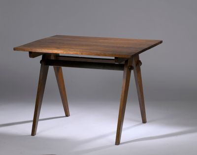 a close up of a small wooden table on a white surface