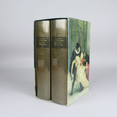 two books that are sitting side by side on a table