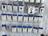 a display of various items on the wall in the store