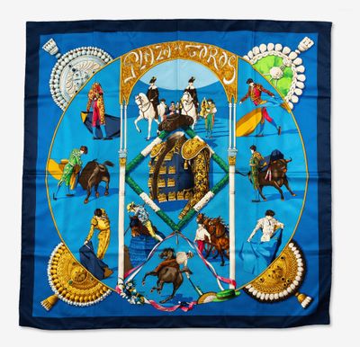 blue silk scarf with a picture of a circus scene on it