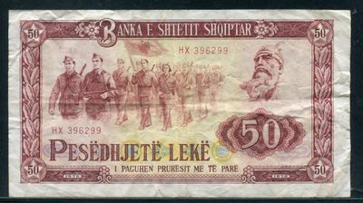a close up of a paper with a picture of people on it