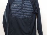 a close up of a jacket hanging on a hanger