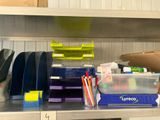 a metal shelf with a bunch of different items on it