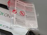 a box of xbox one sitting on top of a table