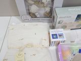 a white box with a stuffed animal and other items on it