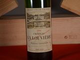 a bottle of wine that is sitting on a table