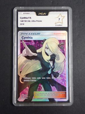 a close up of a card on a table with a black background