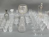 many different types of glassware on the table