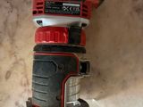 a picture of a corded sander on a table