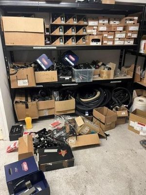 a room with a lot of boxes and boxes on the floor