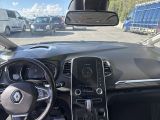 a view of the inside of a car from the driver ' s seat