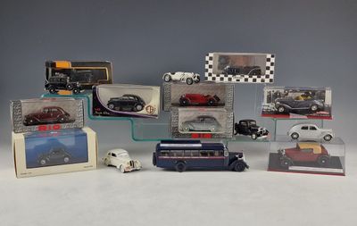 a lot of toy cars that are sitting on a table