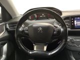 the interior of a car with a steering wheel and dashboard controls