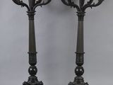 pair of antique bronze candelabs on marble bases