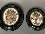 two black and white plates with a picture of a squirrel and a squirrel