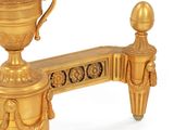 a gold trophy on a stand on a white background