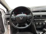 the interior of a car with a steering wheel and dashboard controls