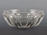a glass bowl that is sitting on a table