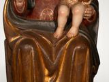an image of a statue of a woman holding a baby