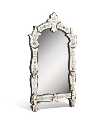 an image of a mirror that is sitting on top of a table
