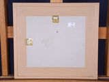an image of a picture frame sitting on top of a wooden easel
