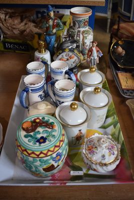 a tray with a tray of tea cups and saucers on it